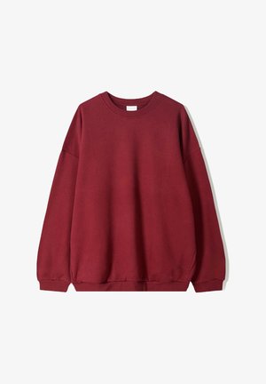 Bordeaux sweatshirt met een relaxte pasvorm, voorzien van een ronde halslijn en verlaagde schouders, weergegeven tegen een effen witte achtergrond.
