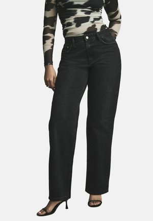 Zwarte wijde jeans met hoge taille, denim stof, voorzakken en subtiele stikdetails. Draag met een gemusterd bovenstuk en hakken.